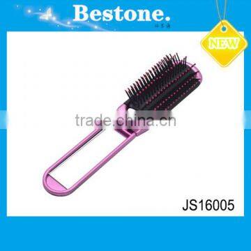 Folding pocket mirror with comb