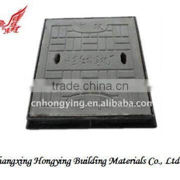 Polymer concrete manhole cover
