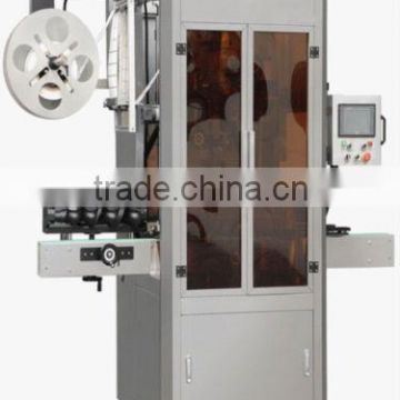 Automatic bottle shrinking label machine