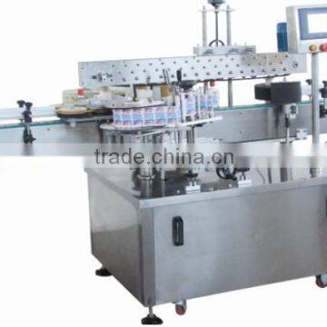 Automatic self-adhesive bottle labeling machine