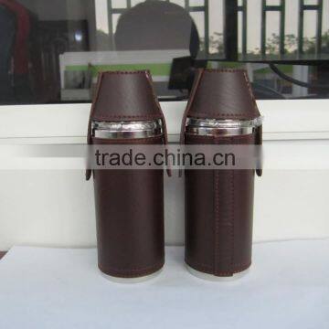 Cylindrical Shape and Suture and Leather Wrapped Bottle and 2 Glasses