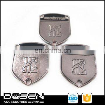 Custom Sewing on Shield Emblem Shape Metal Badges 3D Sand Blast Matte Metallic Logo Labels for Garment Leather Jackets Suitcase