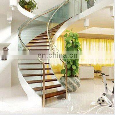 luxury modern stair glass railing curved stairs wood treads interior staircase