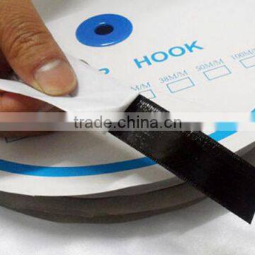 Double sided self adhesive hook and loop tape back with gule