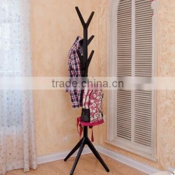 wooden clothes tree in different colors