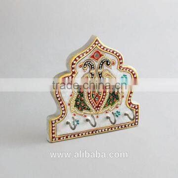 marble temple shaped key holder with peacock design