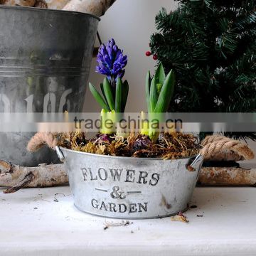 galvanized metal garden planter and flower pot