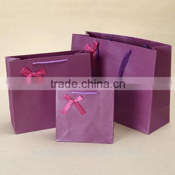 Ivory board /art paper bag ,shopping bags,promotion bag , customized printing is welcome,with bow-knot Decor