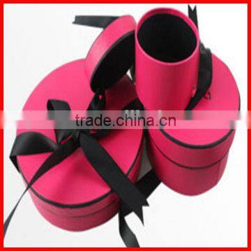 Wholesale luxury pink round cardboard box with black ribbon