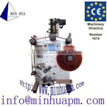 semiautomatic round bottle labeling machine SL-125.