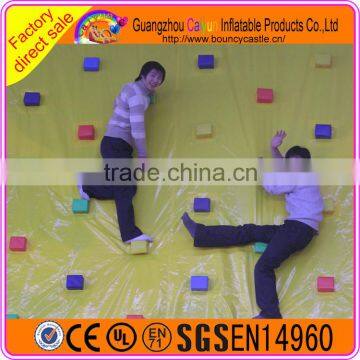 Interesting games inflatable rock climbing wall in stock