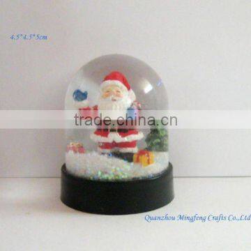 Plastic santa claus water snow globe