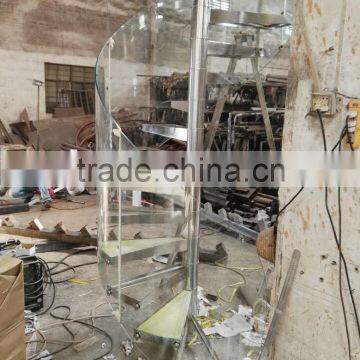 Modern Spiral Staircase With Glass Treads and Glass Railings photo-5