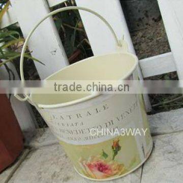 Decorative painted tin bucket