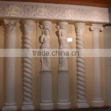 white marbe stone columns with carving