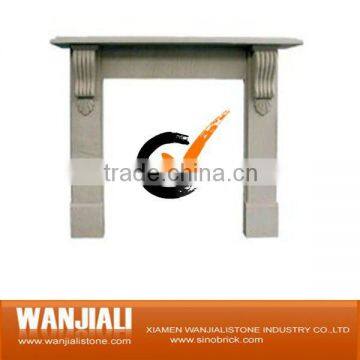 white sandstone fireplace