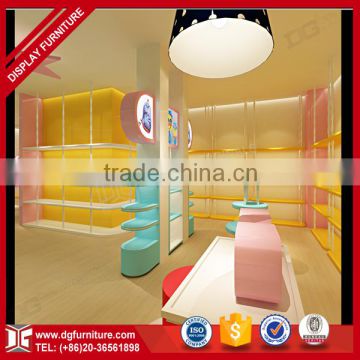 Simple interior design baby and kids clothes shop decoration