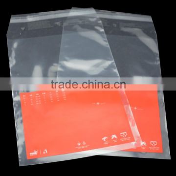 custom size PP material transparent self adhesive packing bag with red printing