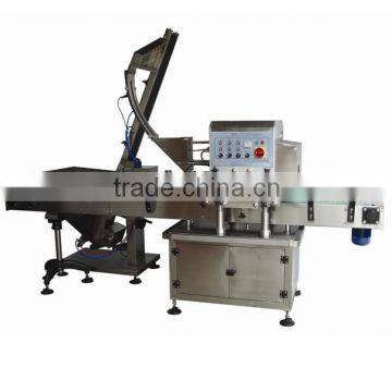 Automatic high-speed linear capping machine with vaccum system