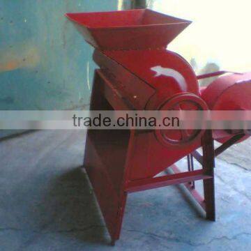 Corn tore skin thresher