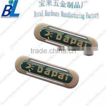 Epoxy coated metal buckle for shoes