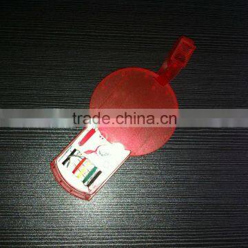 luggage tag with sewing kit