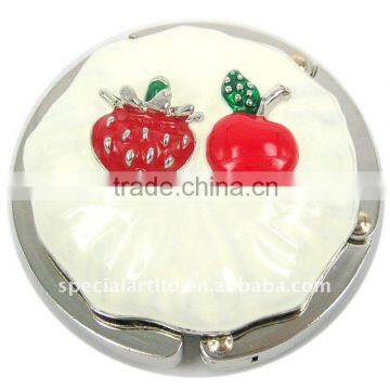 metal cake shaped table bag hanger stand for birthday gifts and premium ,weight capacity : 7kg