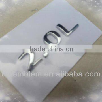 Chrome Plastic 2.0L logo badges