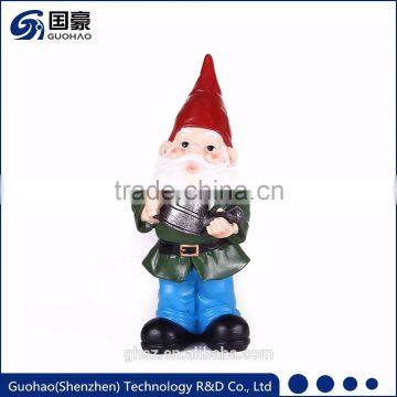 Hand painted christmas garden gnome watering yard gnome