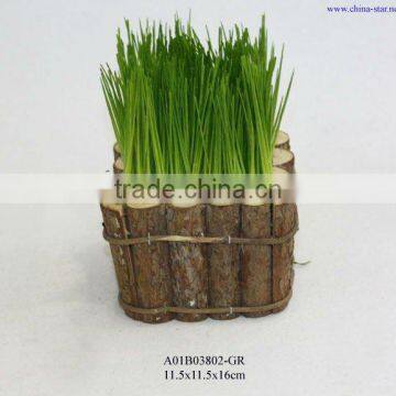 potted artificial grass with wooden planters