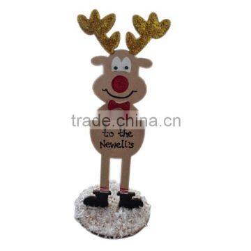 Wooden reindeers Glitter nose Standing on snow covered
