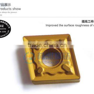 carbide insert with through chpbreaker