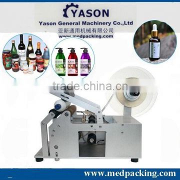 Manual labeling machine for bottles, desktop round bottle labeller machine