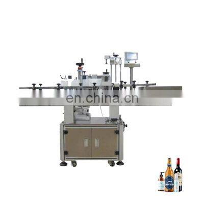 Automatic winding labeling machine for bottled products such as plastic glass