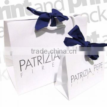 white luxury paper clothes packaging bag with ribbon bow & customized printing logo