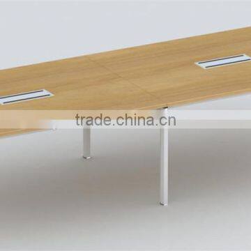 Wooden meeting table with outlet