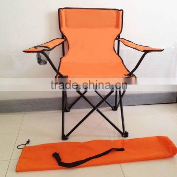 Folding beach chair with cup holder