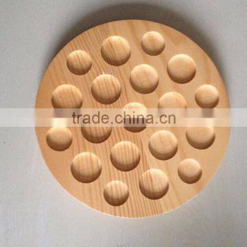 wooden tray with holes to enter market