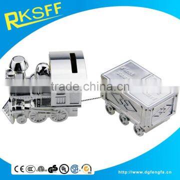 novelty design train shape coin bank connected with tooth and curl box