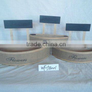 triangle wood flower pots decorated with blue wooden sign