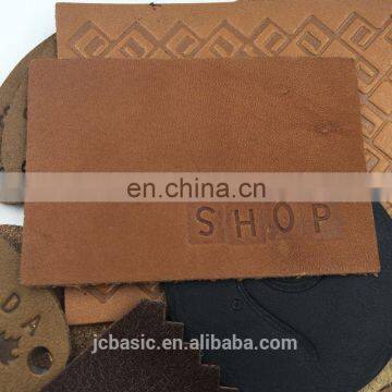 Custom Wholesale Debossed Logo Genuine Leather Label for Jeans Trousers photo-3