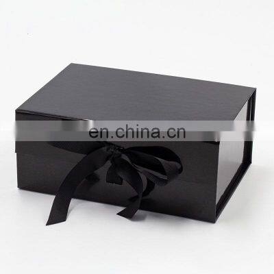 Custom ribbon style glossy lamination black color magnetic closure gift box wholesale