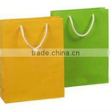 Yellow, green 120gsm kraft paper bags for clotheswith pp handle PB-166