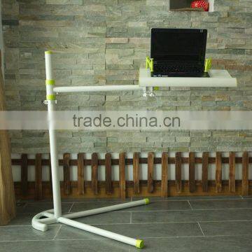 Adjusting portable over bed table movable computer desk