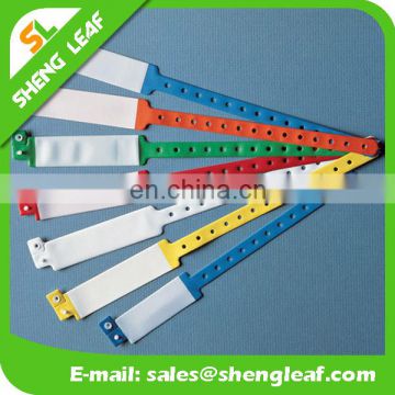 Disposable PVC wristband with plastic button