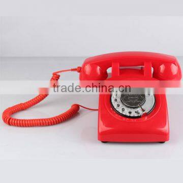 red old-fashioned rotary dial old style telephone