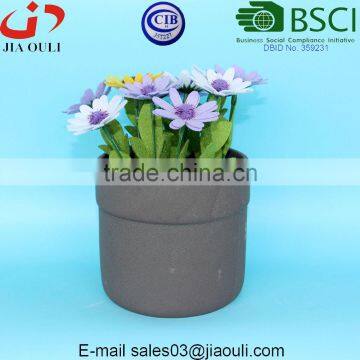 Grey sand surface round ceramic pot, garden pots