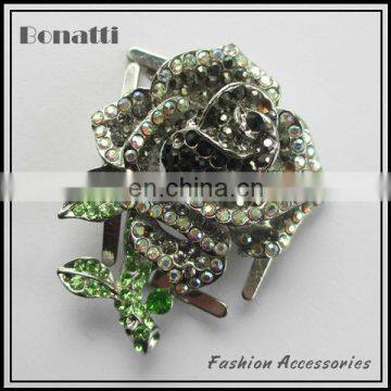 metal flower brooch with colorful rhinestone