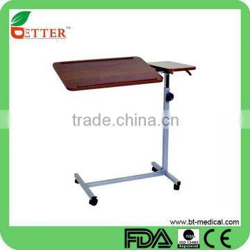 height adjustable over bed table with castors