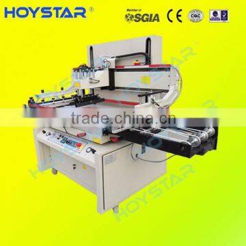 Flat silkscreen machine with automatic unloading system